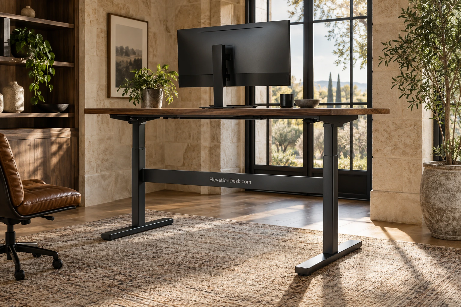 Architectural home office with a walnut adjustable desk and tall windows