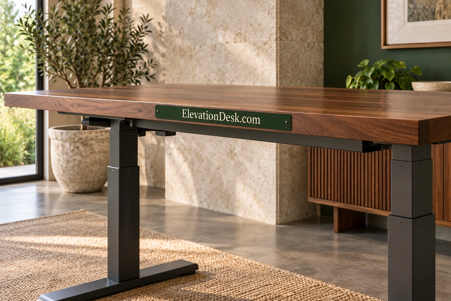 Walnut adjustable desk in a considered showroom